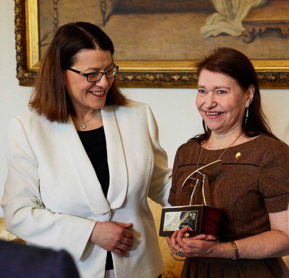 Sue Lopez Atkinson with Minister Mikakos